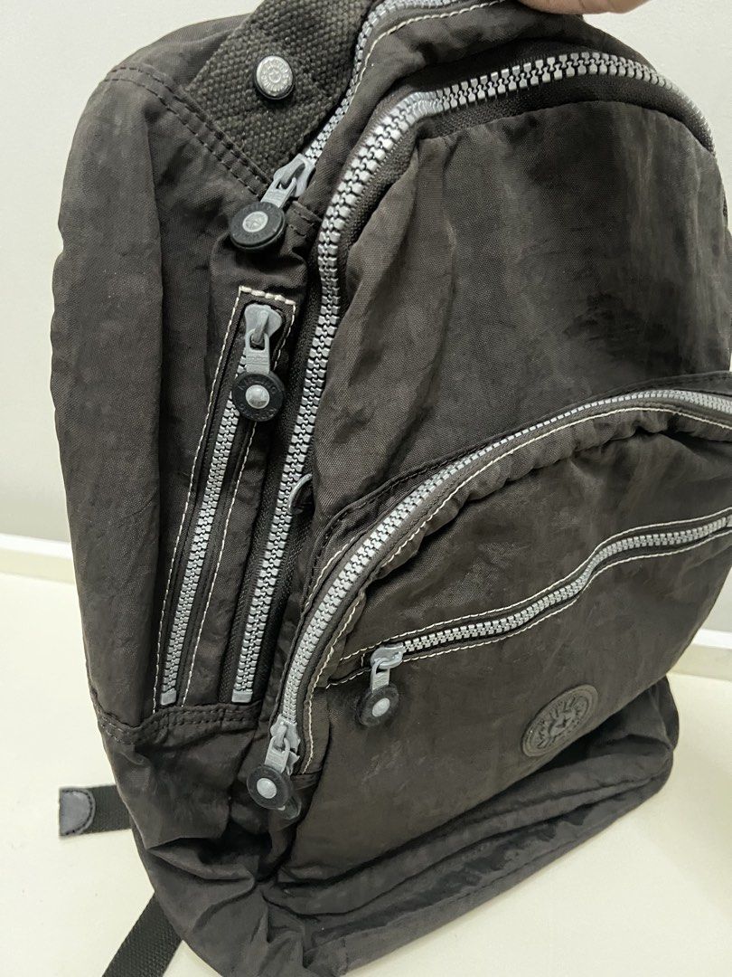 Kipling Brown Nylon Backpack (Category: Backpacks) located in San Fernando. Submitted by ilovemelochan (Listing ID 1467463925, Image 3). Description: - Authentic Kipling backpack in versatile dark brown crinkle nylon - Multiple zipped compartments for easy organization and storage -Fits 15 inches laptop - Great for school bag or travelling bag .