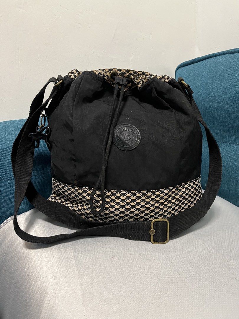 Kipling bucket sling bag (Category: Cross-body Bags) located in Tacurong. Submitted by pearlitas_ukay (Listing ID 1467366760, Image 2). Description: KIPLING SLINGBAG Excellent Medium Need wash Mine 650 matic yours Thrifted •ukayukay.