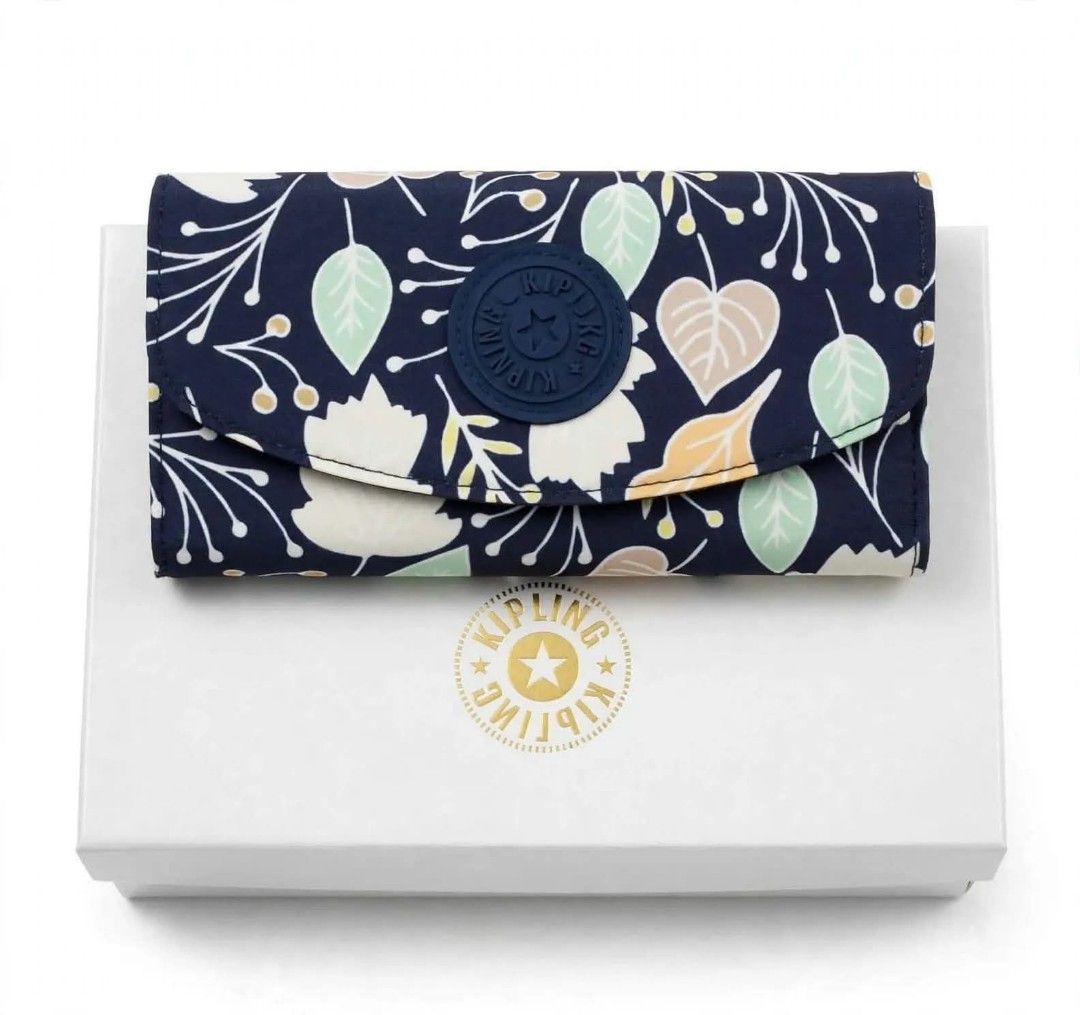 Kipling Navy Blue Leaf Pattern Trifold Wallet with Box (Category: Wallets & Card holders) located in Manila. Submitted by roseannlmn66895 (Listing ID 1467586673, Image 1). Description: ✨ AUTHENTIC KIPLING WALLET - BRAND NEW ✨ Model: Kipling Money Land Snap Wallet Color: Blue / White Leaf Print (rare) Condition: Brand new, never used - with box ✔️ Complete with box ✔️ Snap button with factory code OK. ✔️ Striped Kipling lining inside ✔️ Many card 