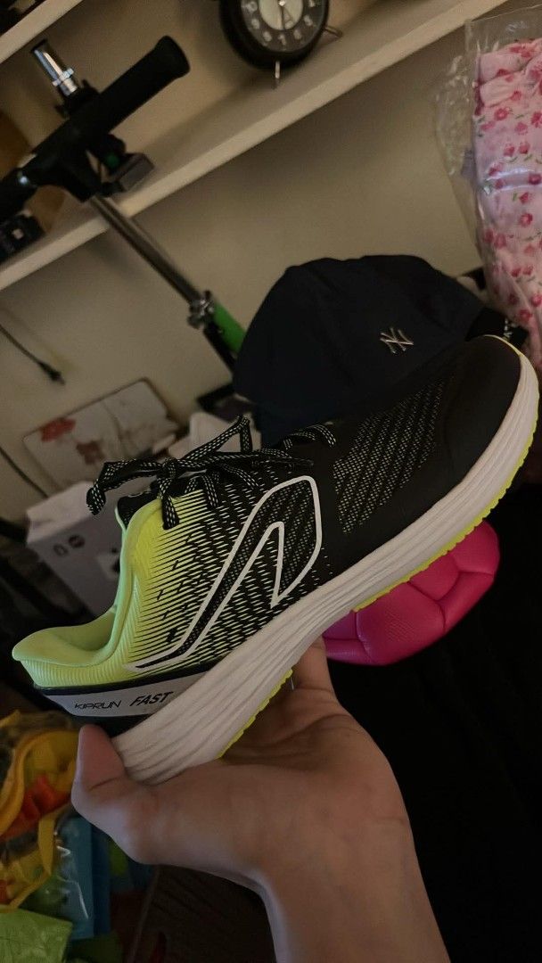 Kiprun Fast Running Shoes Black Lime Green (Category: Sneakers) located in Manila. Submitted by cami1914 (Listing ID 1467413772, Image 1). Description: - Brand/Model: Kiprun Fast running shoes - Colorway: Black and lime green with bright yellow outsole - Upper: Lightweight mesh with supportive overlays for a secure fit - Midsole: Thick white foam for maximum cushioning and comfort - Outsole: Durable patterned rubber providing excellent traction.
