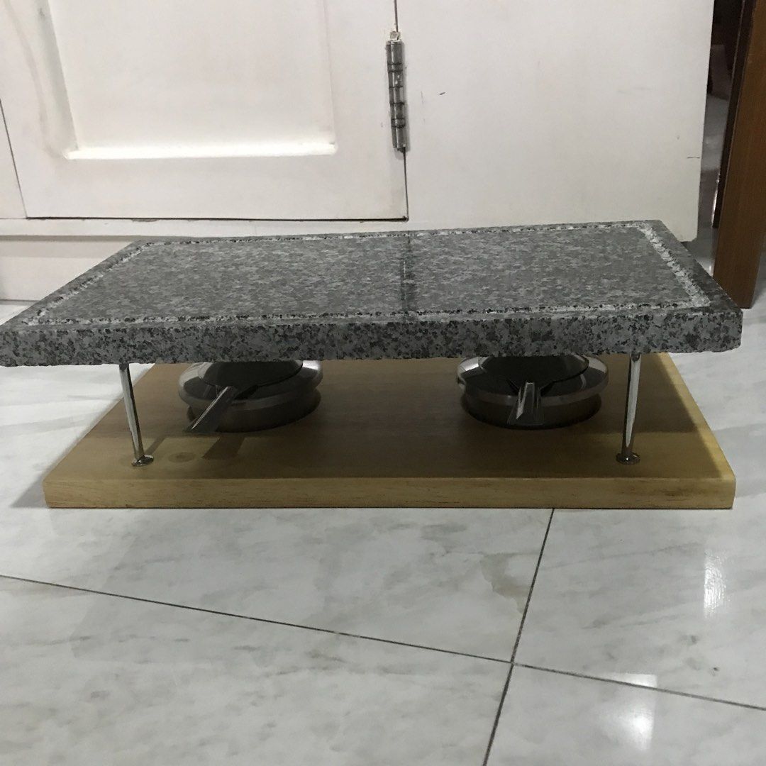 KitchenCraft Artesà Marble Hot Stone Grill Set (Category: Cookware & Accessories) located in Manila. Submitted by junmiller (Listing ID 1467398178, Image 1). Description: - Brand: KitchenCraft Artesà - Type: Table grill set with heavy marble cooking stone - Includes: Sturdy wooden base, wire stand, and two fuel burners - Perfect for: Tabletop cooking, steaks, and entertaining guests - Dimensions: 15 x 22 x 41.5 cm - Condition: Clean and great ove