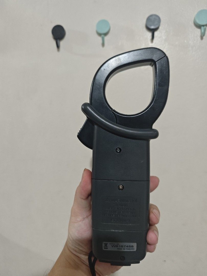 Kyoritsu KEW Snap 2003A AC/DC Clamp Meter (Category: Construction Tools & Equipment) located in Cavite. Submitted by pauduro (Listing ID 1467561884, Image 3). Description: - Brand: Kyoritsu (Made in Thailand) - Model: KEW Snap 2003A AC/DC Clamp Meter - Condition: Powers on clearly with a crisp digital display, clear serial number on the back - Functions: Accurately measures AC/DC voltage, current, and resistance - Inclusions: Original black Kyori