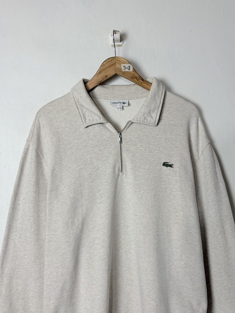 Lacoste Beige Qzip (Category: Coats, Jackets and Outerwear) located in Manila. Submitted by vinthreads (Listing ID 1467410796, Image 2). Description: OG’ Ląc0stę Quarter zip - Beige Size: XL on tag Width: 25/ Length: 28 As new condition Color rate: 10/10 No issue ______________________________________ 📍Note: Color may vary due to lighting..