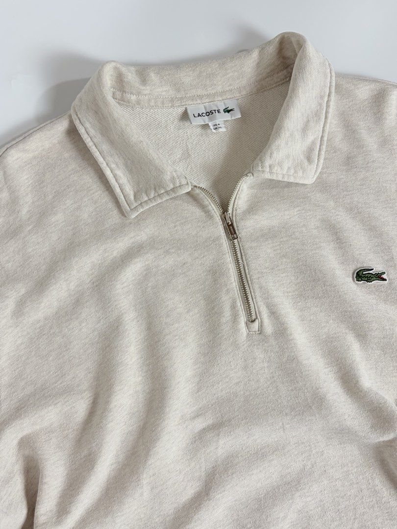 Lacoste Beige Qzip (Category: Coats, Jackets and Outerwear) located in Manila. Submitted by vinthreads (Listing ID 1467410796, Image 3). Description: OG’ Ląc0stę Quarter zip - Beige Size: XL on tag Width: 25/ Length: 28 As new condition Color rate: 10/10 No issue ______________________________________ 📍Note: Color may vary due to lighting..