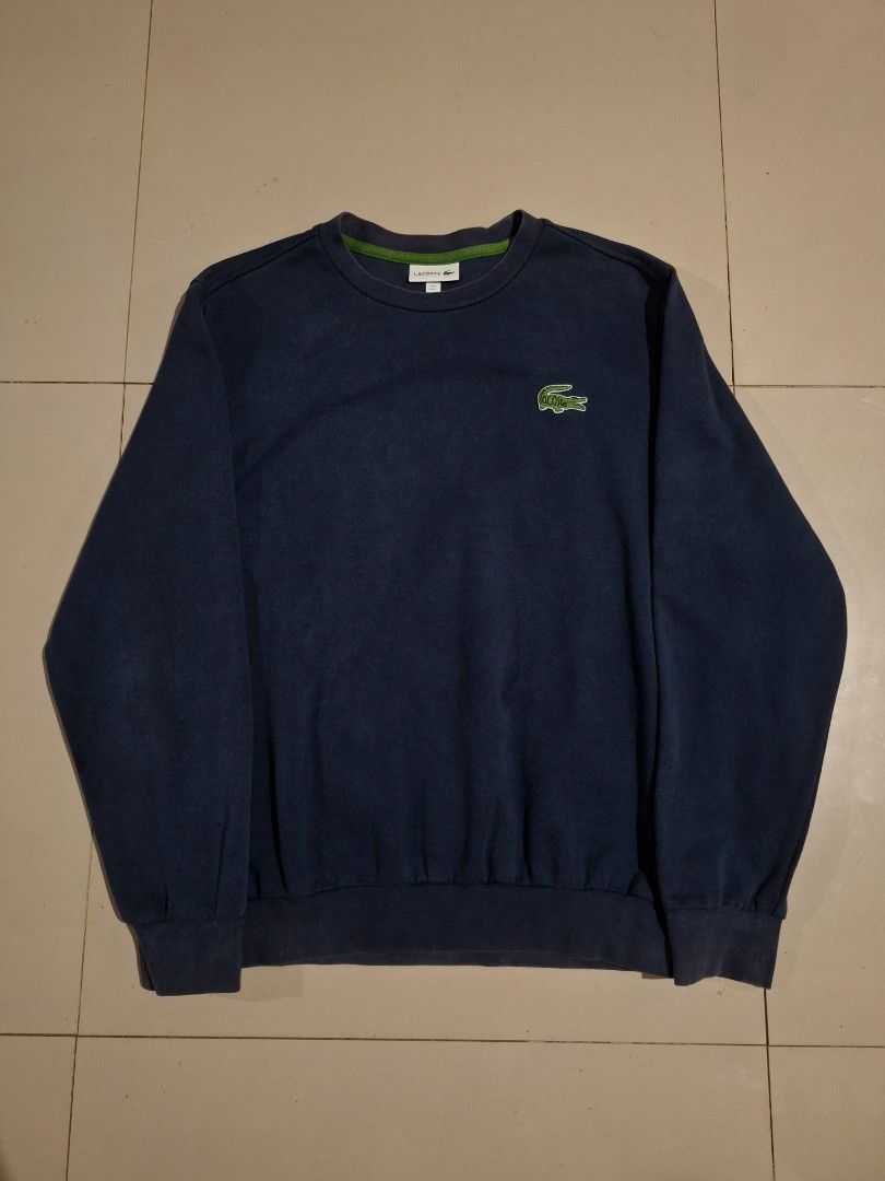 Lacoste Crew neck sweatshirt (Category: Coats, Jackets and Outerwear) located in Cebu City. Submitted by authentica.28 (Listing ID 1467546696, Image 1). Description: Size Large 23/27 dimes Issue: Very tiny slit on sleeve (not noticeable) Very good condition good for resell or for use AUTHENTICITY GUARANTEED✅️.