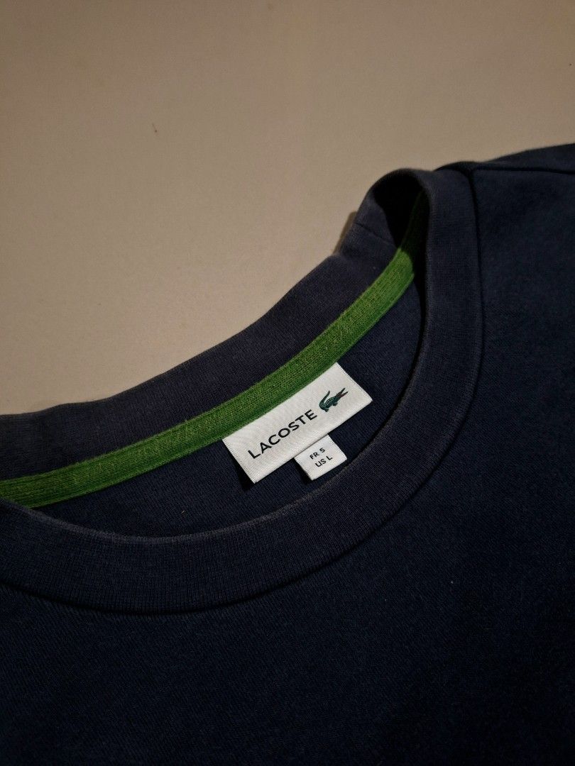 Lacoste Crew neck sweatshirt (Category: Coats, Jackets and Outerwear) located in Cebu City. Submitted by authentica.28 (Listing ID 1467546696, Image 3). Description: Size Large 23/27 dimes Issue: Very tiny slit on sleeve (not noticeable) Very good condition good for resell or for use AUTHENTICITY GUARANTEED✅️.