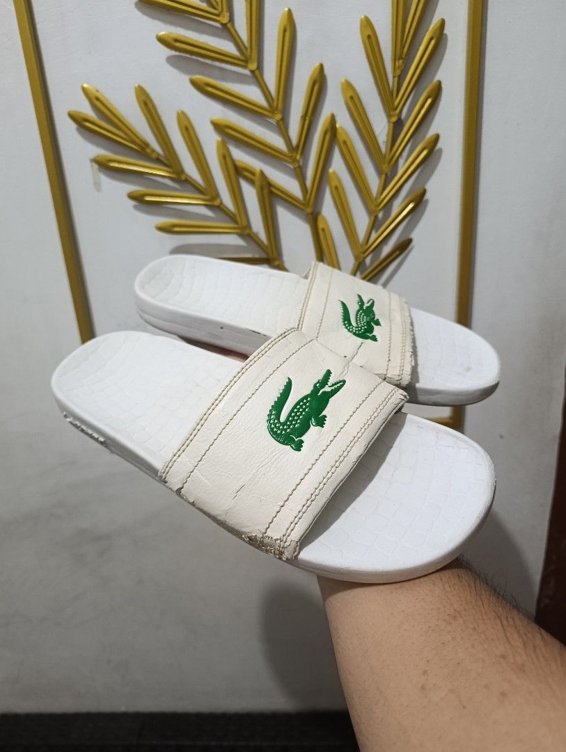 Lacoste slide (Category: Slippers & Slides) located in Mandaluyong City. Submitted by kasoysoythrift28 (Listing ID 1467552611, Image 2). Description: us7 mens.