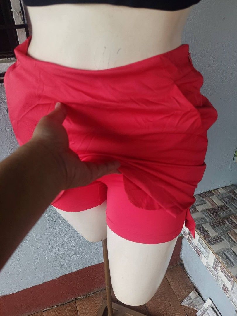Lacoste Sport Red Skort Size 34 (Category: Skirts) located in Caloocan City. Submitted by abbethany1306 (Listing ID 1467467763, Image 2). Description: - Brand: Lacoste Sport - Item: Athletic Skort - Size: 34 - Color: Vibrant Red - Features: Built-in shorts for comfort and movement, secure elastic waistband - Detail: Signature embroidered green crocodile logo on the side - Condition: Clean fabric throughout, great for sports and tennis.