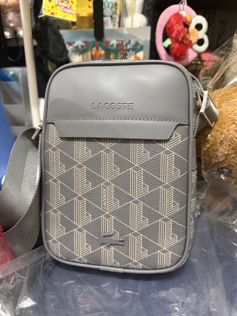 Lacoste The Blend Satchel Sling Bag (Category: Sling Bags) located in Manila. Submitted by angelsdepot (Listing ID 1464141517, Image 2). Description: Brandnew Lacoste sling bag. Color in Mono Castlerock string. .