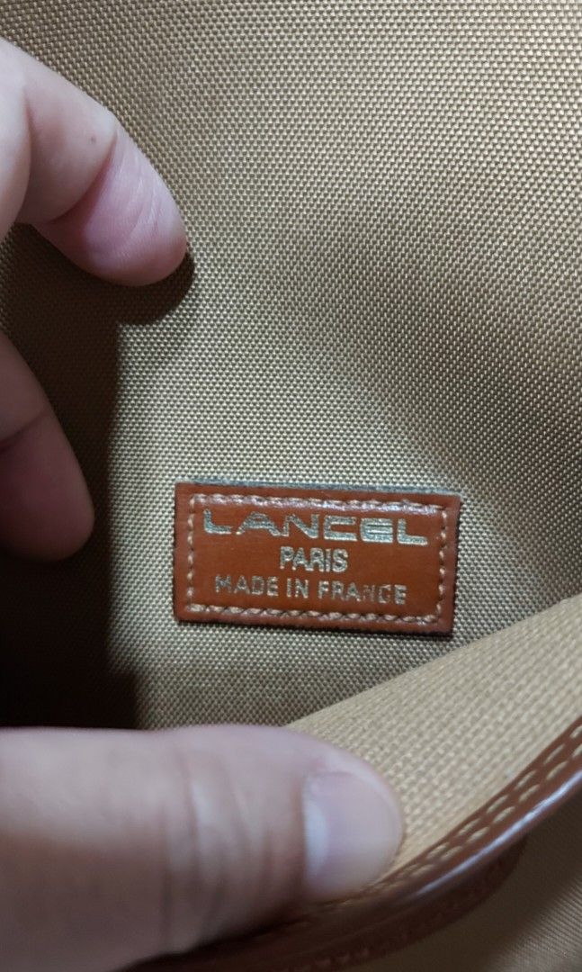 LANCEL nylon messenger/sling bag (Category: Sling Bags) located in Quezon City. Submitted by threetwotwo2ndaccount (Listing ID 1467366203, Image 3). Description: LANCEL nylon messenger/sling bag made in france size: H-13.5", L-11" eclair zipper no inclusion bawal sa maselan bawal sa barat.