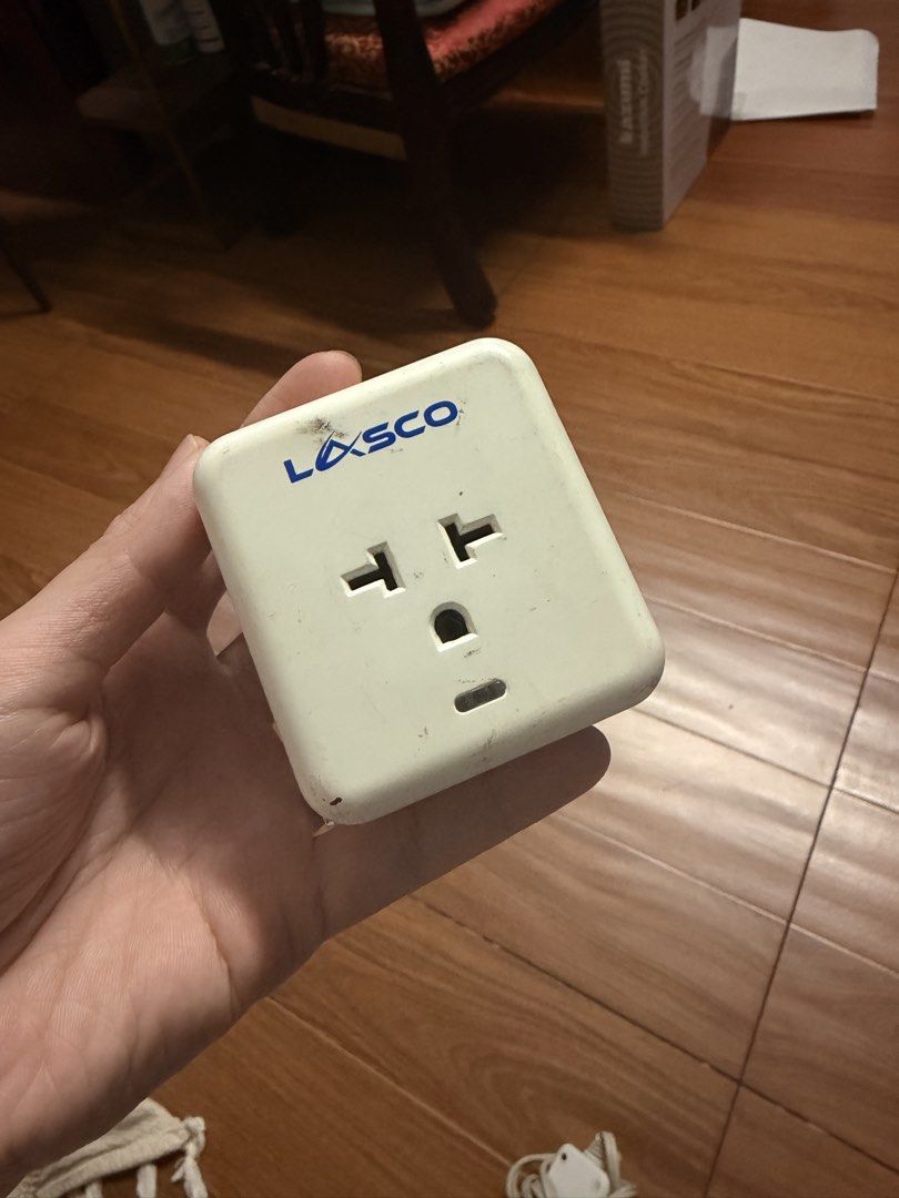 Lasco Smart Plug (Category: Electrical, Adaptors & Sockets) located in Quezon City. Submitted by shop.leilou (Listing ID 1467465429, Image 1). Description: - Brand: Lasco Home Security and Automation - Built-in 5-minute power delay to protect appliances from power surges - Designed for 220V power systems - Heavy-duty capacity: Supports up to 16A (aircon) and 10A (electric fan) - Design: Compact white square body with standard back prongs and mixe