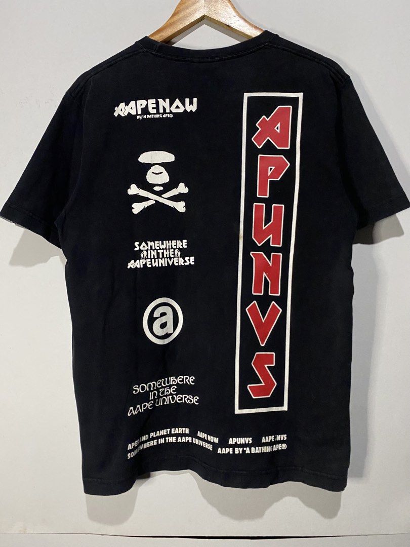 LEGIT AAPE TSHIRT (Category: Tshirts & Polo Shirts ) located in Jaen. Submitted by oshimamark58418 (Listing ID 1467539098, Image 1). Description: - Brand: AAPE by A Bathing Ape (Legit) - Color: Black - Size: Large (US 42 / EU 52) - Condition: 7/10 (shows natural vintage wear/fading and slight mark on front logo) - Design: Iconic Aape Now logo on chest, 'The Aape Universe' text on side, and bold graphic prints on the back - Fit: Comfortable cotton