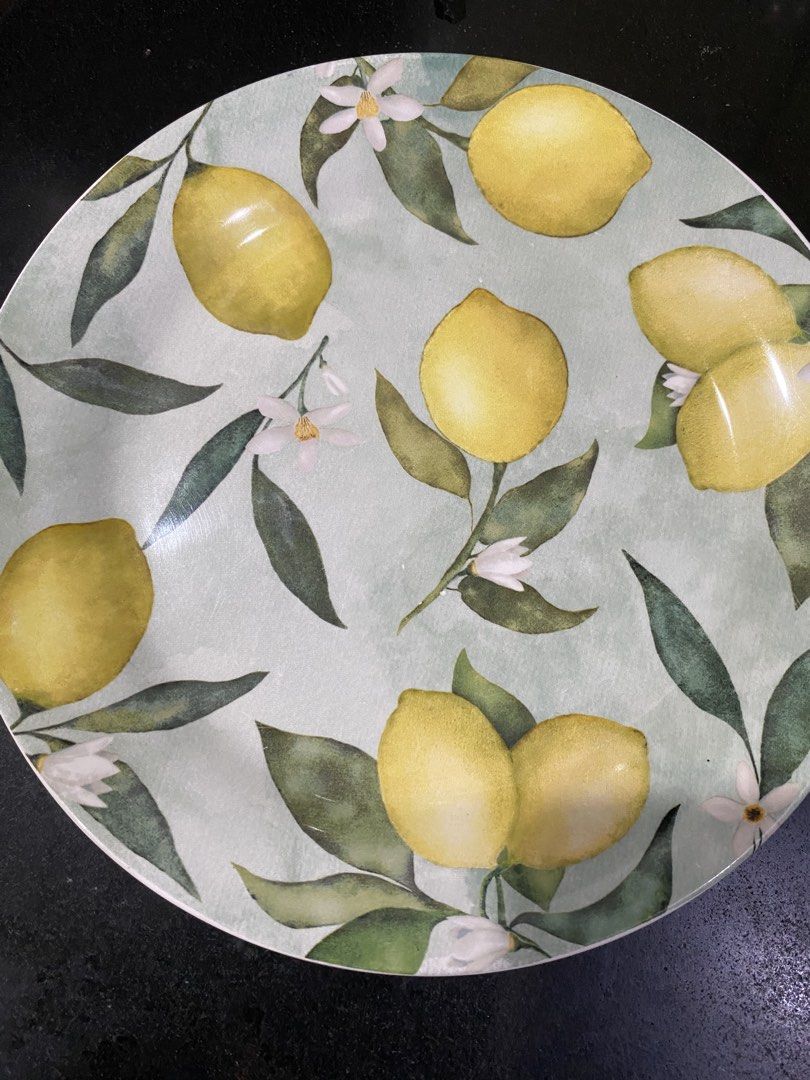 Lemon Print Ceramic Dinner Plates Set (Category: Dinnerware & Cutlery) located in Paranaque City. Submitted by puhshop (Listing ID 1467423143, Image 3). Description: - 2 SETS. 1 set never used /1 set barely used of 4 ceramic dinner plates and 4 ceramic salad plates for summer dining or table styling. BICO - Includes 4 plates with white centers and a lemon border - Includes 4 plates with a sage green background and watercolor lemons and blossoms -