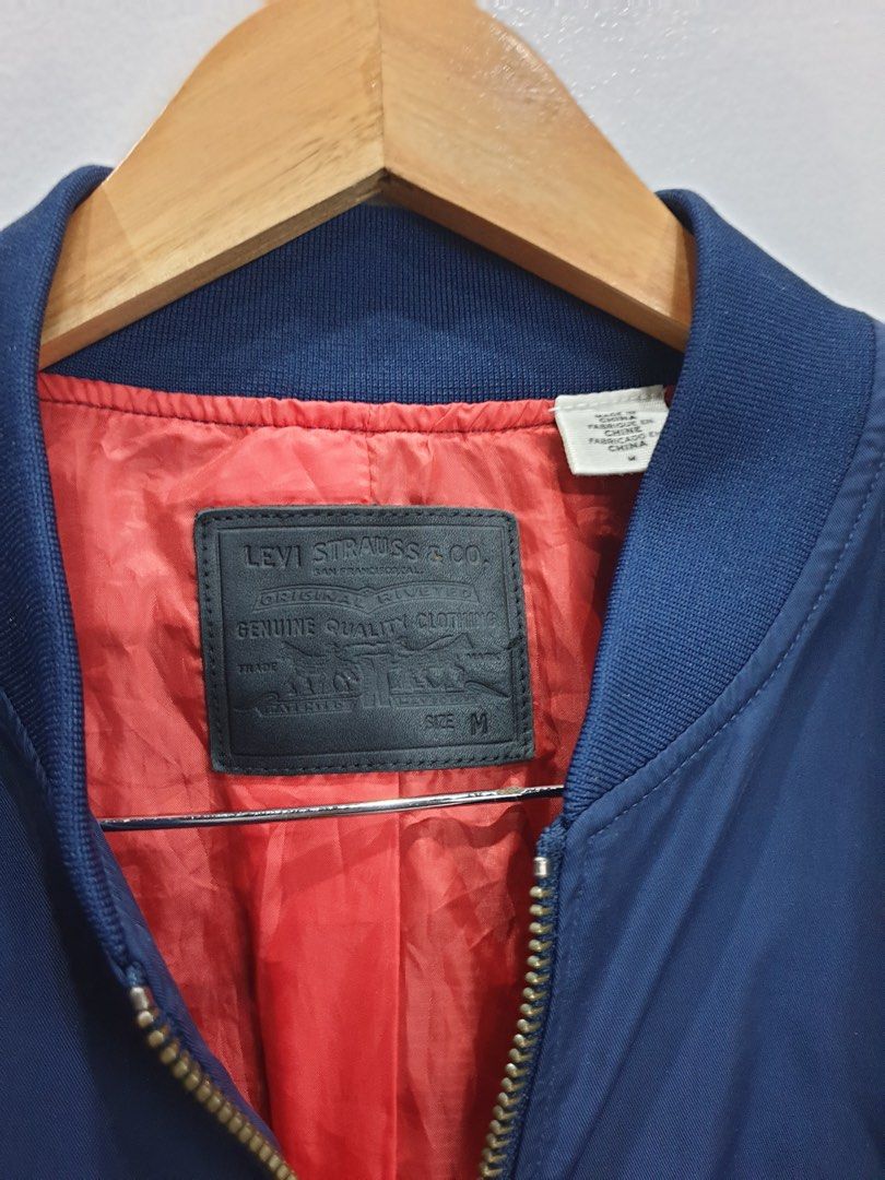 Levi’s Bomber Jacket in Navy Blue (Category: Coats, Jackets and Outerwear) located in Calamba. Submitted by mimabuy (Listing ID 1467377482, Image 2). Description: Actual size is Best fit for medium to Large still in good condition .