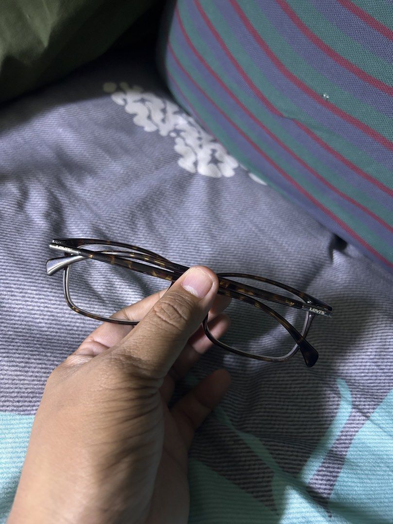 Levi's LS03098 C02 DEMI Tortoise Shell Eyewear Frames (Category: Sunglasses & Eyewear) located in Quezon City. Submitted by thriftxgoods (Listing ID 1467451099, Image 3). Description: - Brand: Levi's - Model: LS03098 C02 DEMI - Color/Pattern: Tortoise Shell (Demi) - Size: 54-17-145 - Shape: Classic rectangular with temple branding - Condition: Clean, minimal signs of handling - Lenses: Prescription lenses installed (easily replaceable at any opti