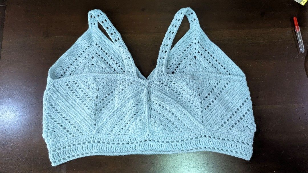 Light Blue Crochet Bralette Tank Top (Category: Sleeveless) located in Quezon City. Submitted by applesandoranjess (Listing ID 1467422055, Image 3). Description: Handmade light blue crochet bralette top Size: 34-38" bust stretchable material top still needs bralette underneath to cover gaps between stitches. rfs: decluttering 💳 MOP: GCash/BPI 📦 Shipping Fee to be shouldered by buyer 🚚 lalamove or grab delivery only 📍QC.