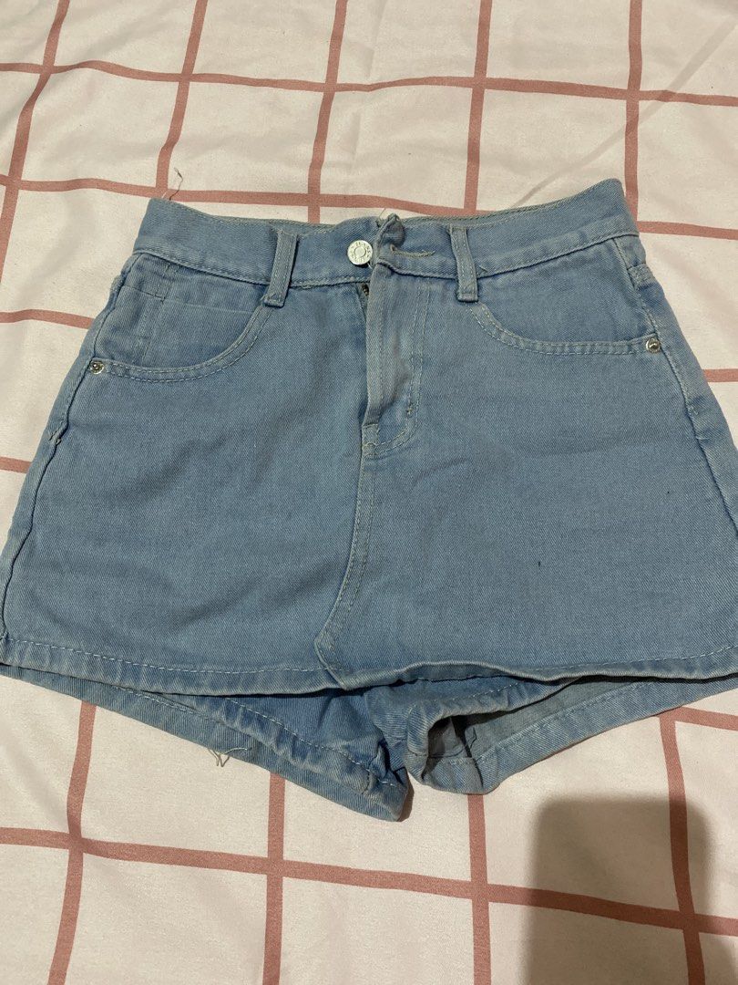 Light blue denim skort shorts (Category: Shorts) located in Pasay City. Submitted by braveflower_52508e (Listing ID 1467418163, Image 1). Description: - Style: Light blue denim skorts (skirt front with built-in shorts) - Wash: Medium wash denim - Features: Classic button & zip fly, belt loops, front and back pockets - Fit: Comfortable and easy to style for warm weather - Pairing: Looks great with basic tees, tank tops, or crop tops - Condition: E