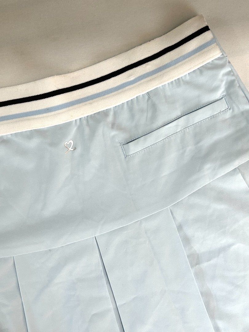 light blue pleated athletic skort (Category: Skirts) located in Manila. Submitted by nikkishops (Listing ID 1467518620, Image 3). Description: ࣪˖⋆𓍢ִ໋ waist: 27 inches ࣪˖⋆𓍢ִ໋length: 17 inches ࣪˖⋆𓍢ִ໋ light blue pleated skort with built-in shorts ࣪˖⋆𓍢ִ໋waistband with white, black, and blue stripes at the back ࣪˖⋆𓍢ִ໋great for tennis, golf, or casual daily outfits.