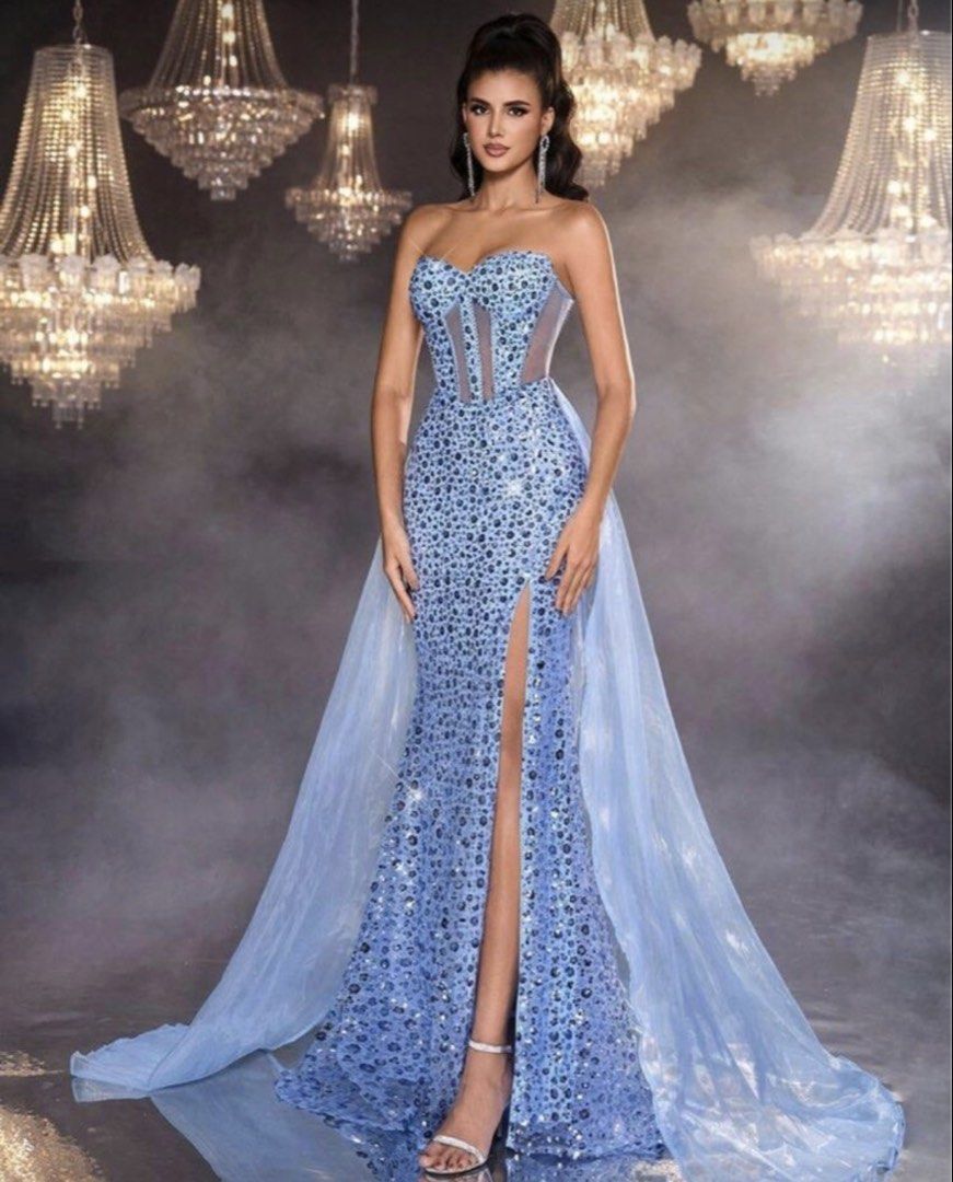 Light Blue Sequin Strapless Evening Gown with Thigh Slit (Category: Evening dresses & gowns) located in Mandaluyong City. Submitted by gomezdanamae15 (Listing ID 1467379027, Image 1). Description: - Color: Light blue - Design: Strapless sequin gown with sheer mesh panels and boning - Features: High thigh slit on the left and attached sheer tulle overskirt with a long train - Condition: Worn once, professionally cleaned - Ideal for: Proms, pageant