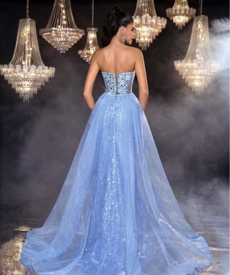 Light Blue Sequin Strapless Evening Gown with Thigh Slit (Category: Evening dresses & gowns) located in Mandaluyong City. Submitted by gomezdanamae15 (Listing ID 1467379027, Image 2). Description: - Color: Light blue - Design: Strapless sequin gown with sheer mesh panels and boning - Features: High thigh slit on the left and attached sheer tulle overskirt with a long train - Condition: Worn once, professionally cleaned - Ideal for: Proms, pageant