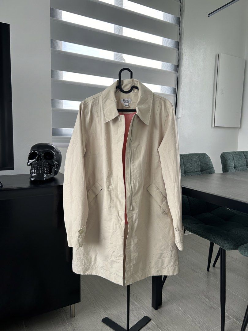 Lilly Pulitzer Cream Trench Coat Jacket (S) (Category: Coats, Jackets and Outerwear) located in Dasmarinas. Submitted by sfclosetcleanup (Listing ID 1467396094, Image 1). Description: 15 x 31.