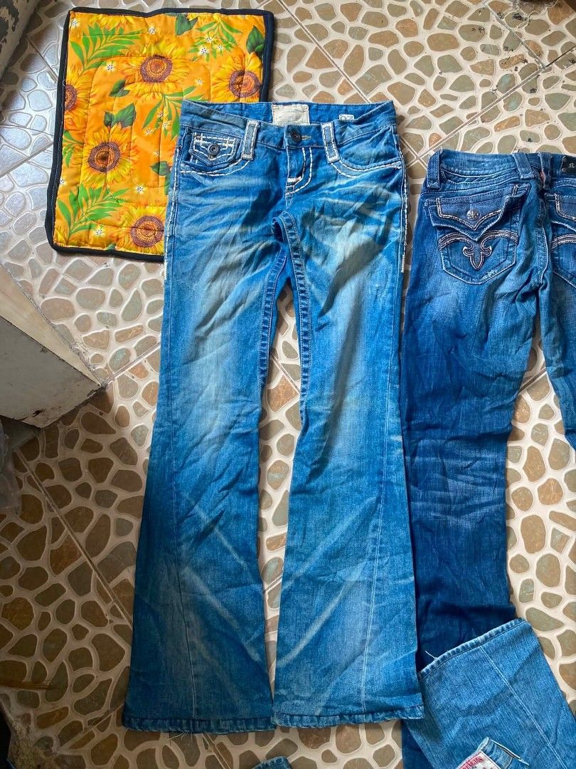 Lolita Thick stitches 🔥 (Category: Jeans) located in Manila. Submitted by ml_thriftph (Listing ID 1467396388, Image 1). Description: 27w 39L negotiable - Style: Y2K aesthetic light wash denim with heavy flare legs - Details: Unique white contrast stitching on pockets, seams, and waistband - Fit: Mid-rise with button closures - Pockets: Convenient flap back pockets - Material: Super comfortable fabric - Note: Dark wash pair also available in phot