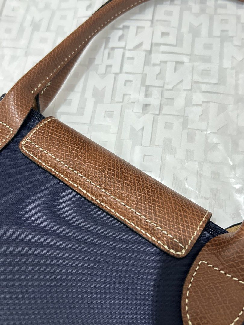 Longchamp Le Pliage Marine (Category: Luxury Bags & Wallets) located in Quezon City. Submitted by luxurybyluci (Listing ID 1467601176, Image 3). Description: Longchamp Le Pliage Marine Medium & Large 7,000 Medium 7,500 Large with inclusion authentic .