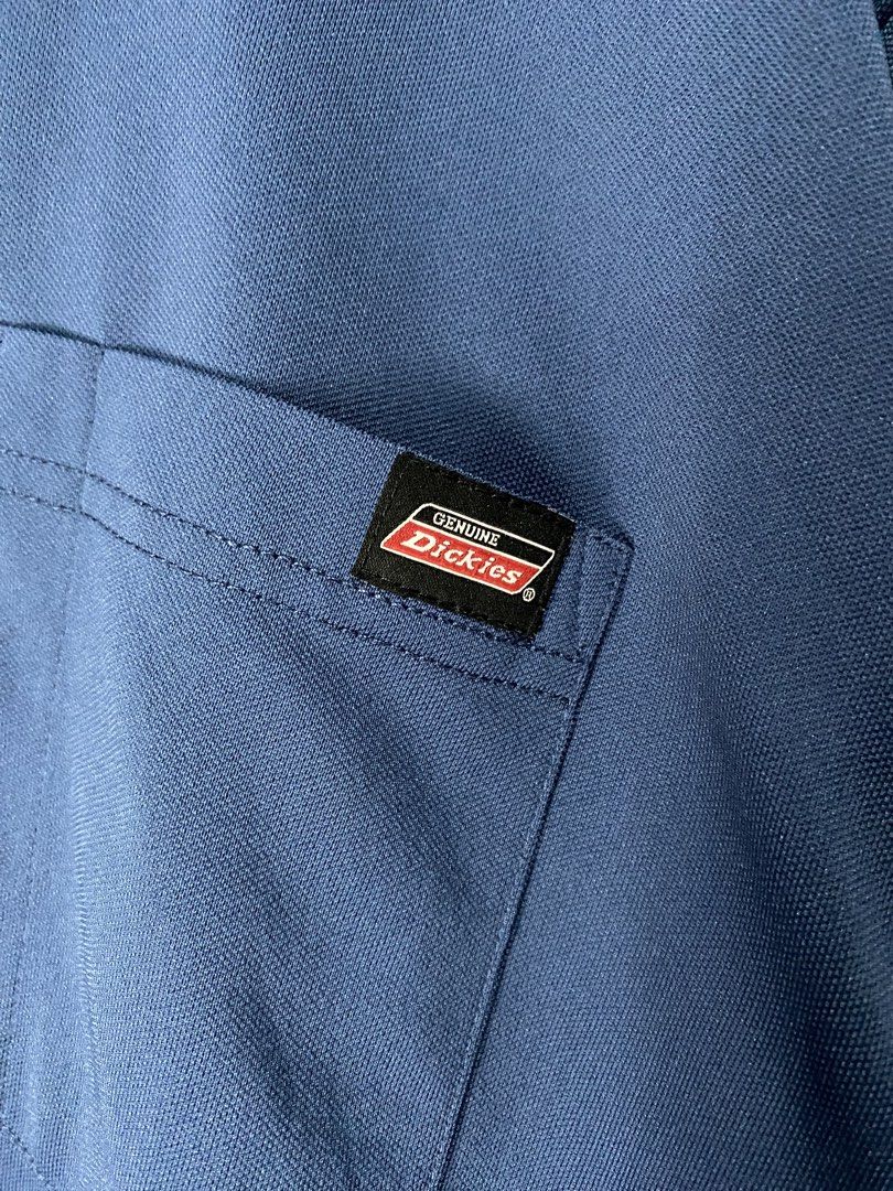 LONGSLEEVE DRYFIT (Category: Coats, Jackets and Outerwear) located in Jaen. Submitted by oshimamark58418 (Listing ID 1467518819, Image 3). Description: - Brand: Genuine Dickies - Type: Longsleeve Dryfit Shirt - Color: Blue - Size: 2XL (Approx. 23" width x 31" length) - Material: 100% Polyester (made in Lesotho) - Features: Chest pocket with Dickies logo patch, moisture-wicking dryfit fabric - Condition: Excellent pre-owned condition.
