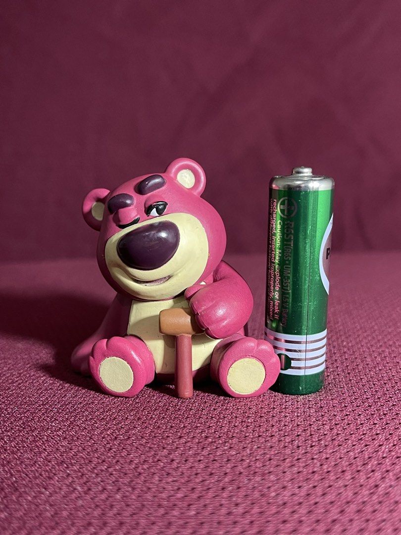 Lots-o'-Huggin' Bear (Lotso) (Category: Figurines & Statues) located in Manila. Submitted by dstrangerthings (Listing ID 1467562840, Image 2). Description: - Official Disney Pixar T-Arts merchandise (stamped on the back) - Features Lotso sitting down and holding his signature cane - Great little collectible for Toy Story fans.