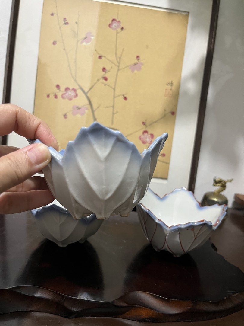 Lotus leaf ceramic bowls / candle holders,sold per piece ,3piece avsilable (Category: Dinnerware & Cutlery) located in Taguig. Submitted by minmin_parker (Listing ID 1467476476, Image 3). Description: - unique lotus leaf-shaped ceramic bowls - Beautiful white glaze with blue gradient tips and red line detailing - Multi-functional: use as serving bowls, trinket dishes, or candle holders - Space-saving and stackable for easy storage - Perfect for h