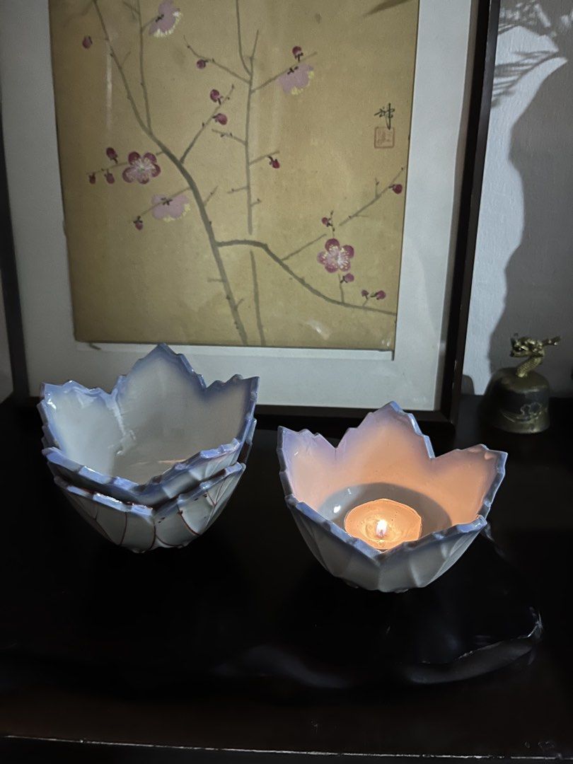 Lotus leaf ceramic bowls / candle holders,sold per piece ,3piece avsilable (Category: Dinnerware & Cutlery) located in Taguig. Submitted by minmin_parker (Listing ID 1467476476, Image 1). Description: - unique lotus leaf-shaped ceramic bowls - Beautiful white glaze with blue gradient tips and red line detailing - Multi-functional: use as serving bowls, trinket dishes, or candle holders - Space-saving and stackable for easy storage - Perfect for h