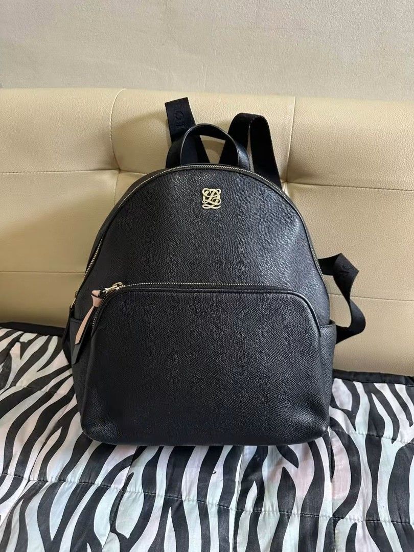 Louis Quatorze black leather backpack (Category: Backpacks) located in Las Pinas. Submitted by wisedragon-84af (Listing ID 1467467928, Image 1). Description: .