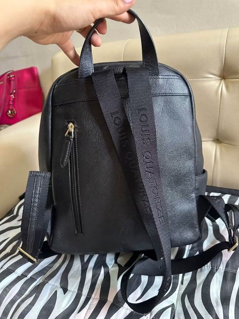 Louis Quatorze black leather backpack (Category: Backpacks) located in Las Pinas. Submitted by wisedragon-84af (Listing ID 1467467928, Image 3). Description: .