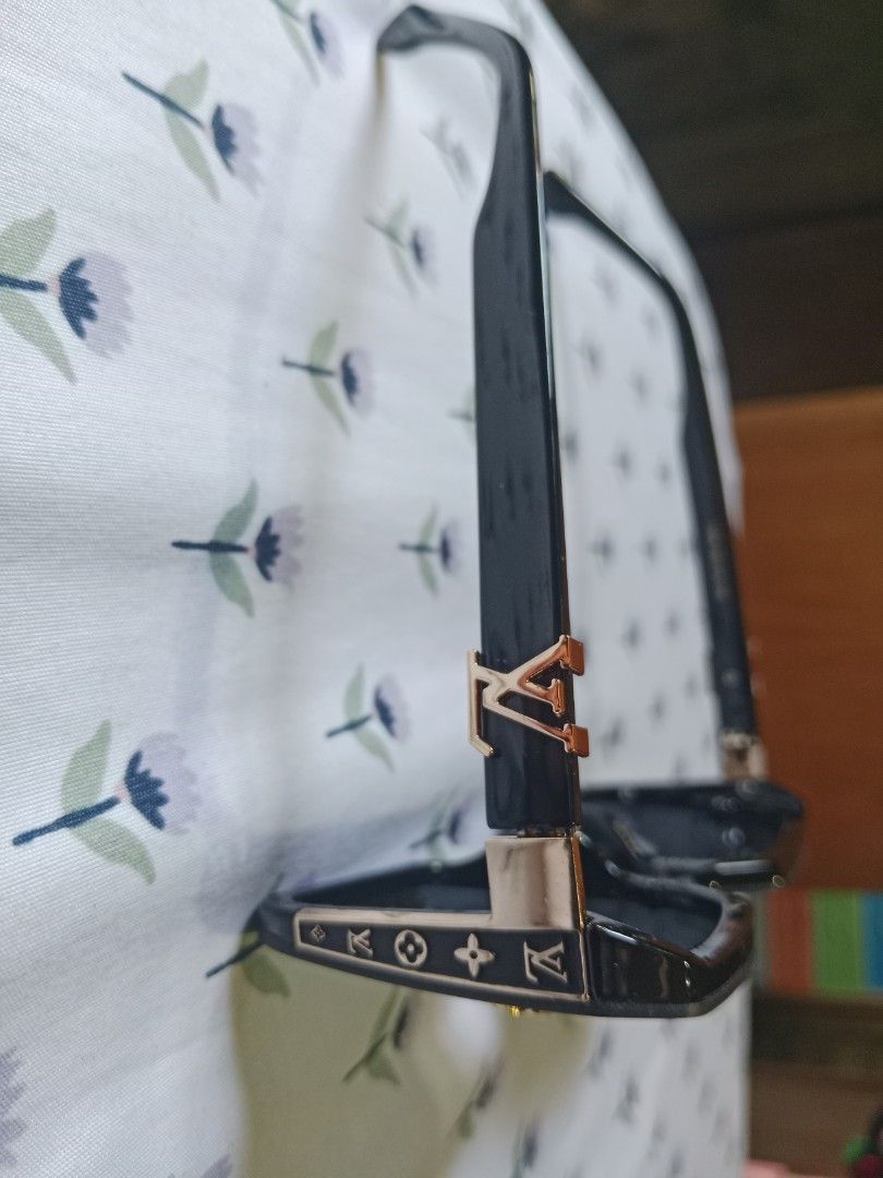Louis Vuitton Black Square Sunglasses with Case (Category: Sunglasses & Eyewear) located in San Miguel. Submitted by chriswajer65155 (Listing ID 1467375892, Image 2). Description: - Brand: Louis Vuitton - Style: Black oversized square sunglasses - Details: Gold-tone LV initials on temples, signature monogram flower on hinges and frame corners - Lenses: Dark tinted with subtle logo text (zero scratches noticed) - Condition: Clean, well-maintained 