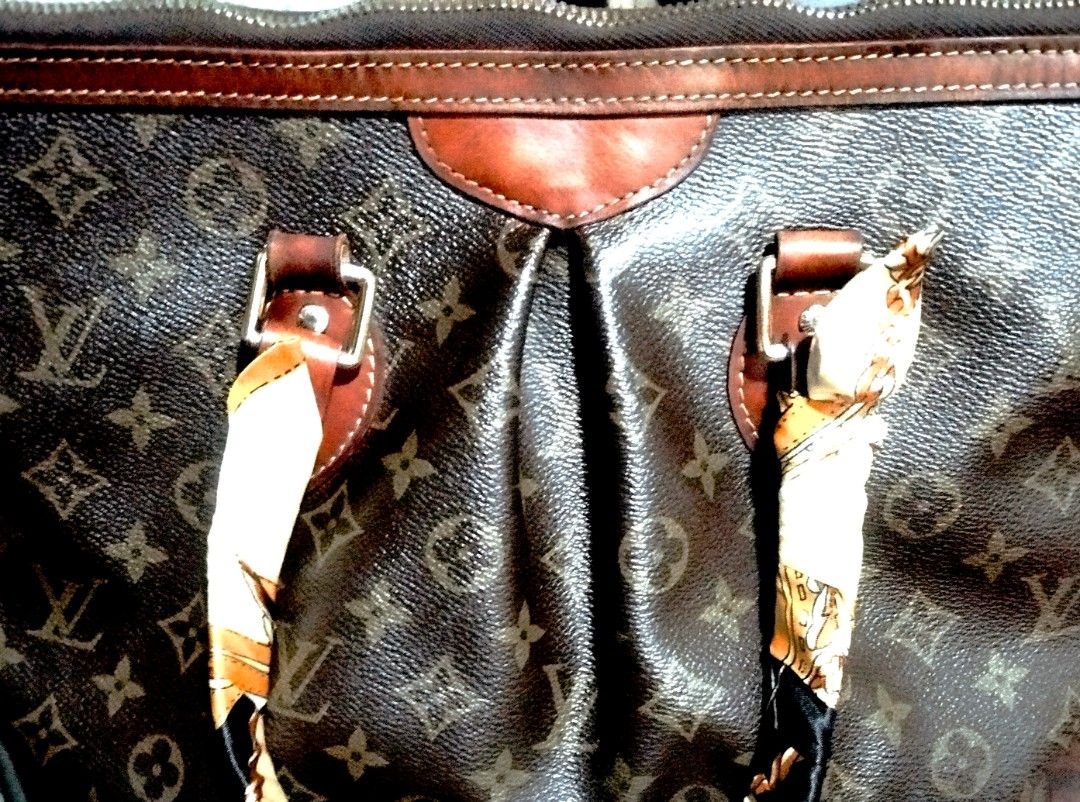 Louis Vuitton Monogram Canvas Handbag (Category: Tote Bags) located in Manila. Submitted by lene48 (Listing ID 1467413016, Image 2). Description: - Classic brown monogram canvas tote bag - Dark leather trim and twin top handles with decorative silk twill scarf - Secure zipper closure across the top - Stylish soft pleated design on the front panel - Clean and spacious interior lining - Elegant gold-tone hardware throughout.
