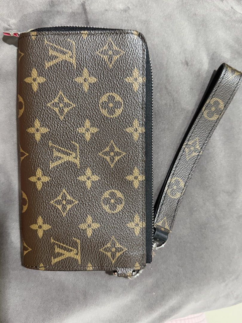 Louis Vuitton Monogram Eclipse Clutch Wallet (Category: Luxury Bags & Wallets) located in Makati City. Submitted by beadle.yeng (Listing ID 1467494612, Image 2). Description: Reference price of brand new included Just the wallet - no more box etc. thanks - Brand: Louis Vuitton - Material: Monogram canvas with black leather trim - Hardware: Silver-tone - Features: Zip-around closure, multiple card slots, gusseted compartments, and matching wrist s