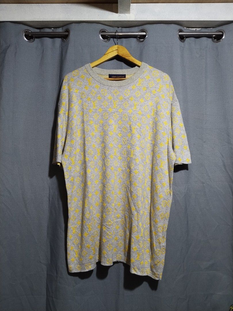 Louis Vuitton Monogram Grey Yellow T-Shirt (Category: Tshirts & Polo Shirts ) located in Pasig City. Submitted by loveforlux_2025 (Listing ID 1467412159, Image 1). Description: - Color: Grey with all-over yellow LV monogram pattern - large fits xl - Fit: Relaxed fit with soft knit material - Details: Dark blue Louis Vuitton Paris collar tag, ribbed collar, and sleeve cuffs - Condition: Clean overall look - Style: Short-sleeve crewneck tee.
