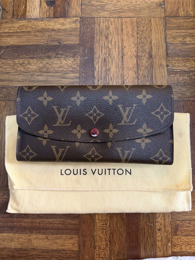 Louis Vuitton Monogram Sarah Wallet with Hot Stamp PDC (Category: Luxury Bags & Wallets) located in Manila. Submitted by paupreloveditems88 (Listing ID 1467393082, Image 1). Description: - Authentic Monogram Canvas Exterior - Striking Red Interior Lining with Gold-Tone Hardware - Features: Multiple card slots, zipped coin pocket, and open compartments - Personalized: Hot-stamped initials "PDC" in gold on the inside flap - Inclusion: Comes with or