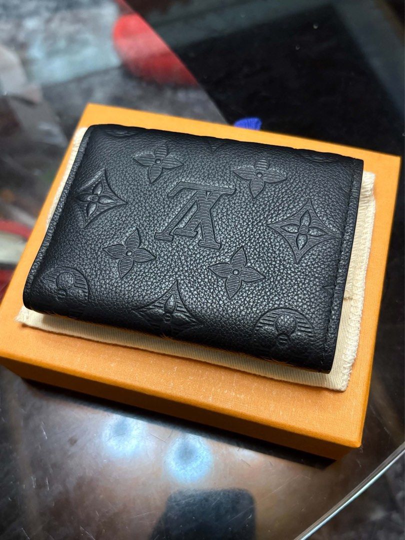Louis Vuitton Monogram victor Black Wallet (Category: Luxury Bags & Wallets) located in Alfonso. Submitted by jbcamet (Listing ID 1467495497, Image 2). Description: - Authentic Louis Vuitton black leather wallet - Includes original orange box and dust bag - Condition: Excellent / Well-maintained - bought at LV greenbelt - RFS: Decluttering closet - Shipping via J&T Express or LBC (sf shoulder of buyer).