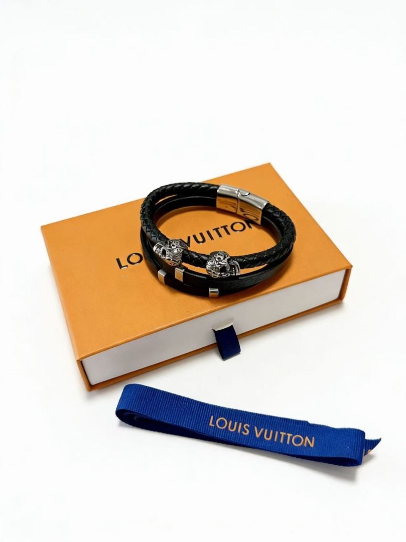 Louis Vuitton Multi-Strand Leather Skull Bracelet (Category: Bracelets) located in Davao. Submitted by colacodawr20358 (Listing ID 1467449431, Image 2). Description: - Authentic Louis Vuitton black leather multi-strand bracelet - Edgy silver skull accents and sleek metallic hardware - Secure magnetic clasp closure for easy wear - Includes original LV branded orange box and blue ribbon - Bold statement piece ideal for everyday styling or gifting -