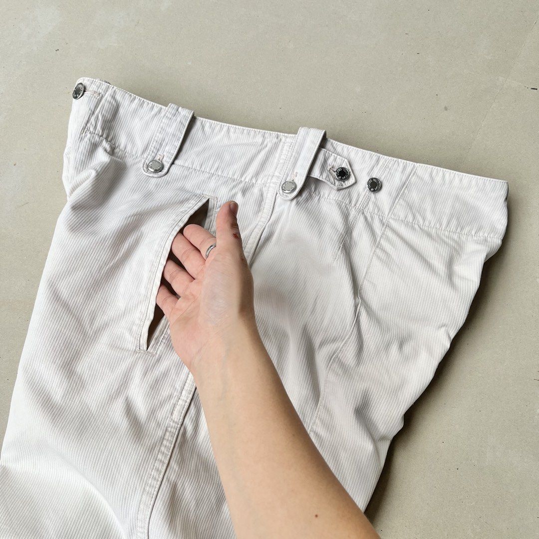 Louis Vuitton Shorts (Category: Shorts) located in Mandaue City. Submitted by chinsyap_03 (Listing ID 1467488967, Image 3). Description: - Brand: Louis Vuitton - Color: White - Material: Premium corduroy - Waistline: 34 inches - Length: 21 inches - Leg Opening: 11 inches - Details: Angled front pockets and branded silver hardware buttons - Authenticity: Inside Louis Vuitton Paris label attached at the waistband.