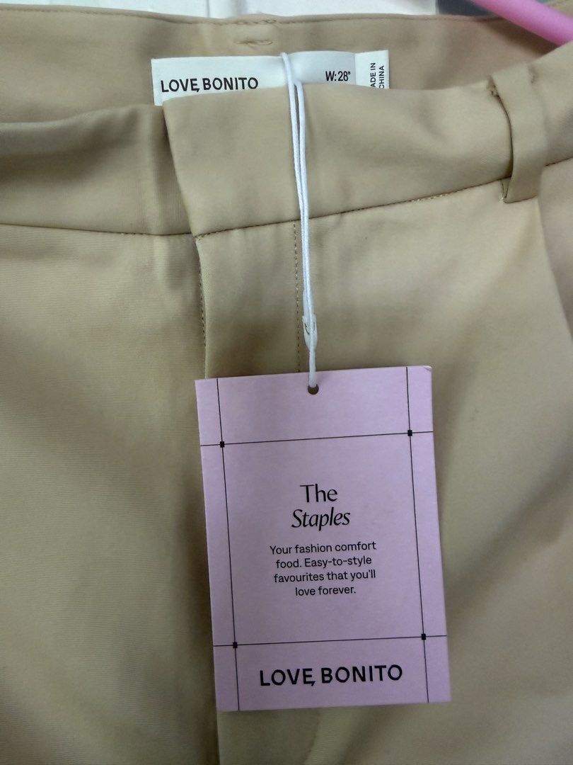 Love Bonito Sand Pants Size 28 (Category: Jeans) located in Zamboanga. Submitted by attyjasc (Listing ID 1467479933, Image 2). Description: - Brand: Love Bonito - Color: Sand - Size: Waist 28 - Condition: Brand new, never worn with original store and fabric tags attached - Fit & Details: Tailored fit, stylish pleated front, and trendy folded cuffs at the hem.