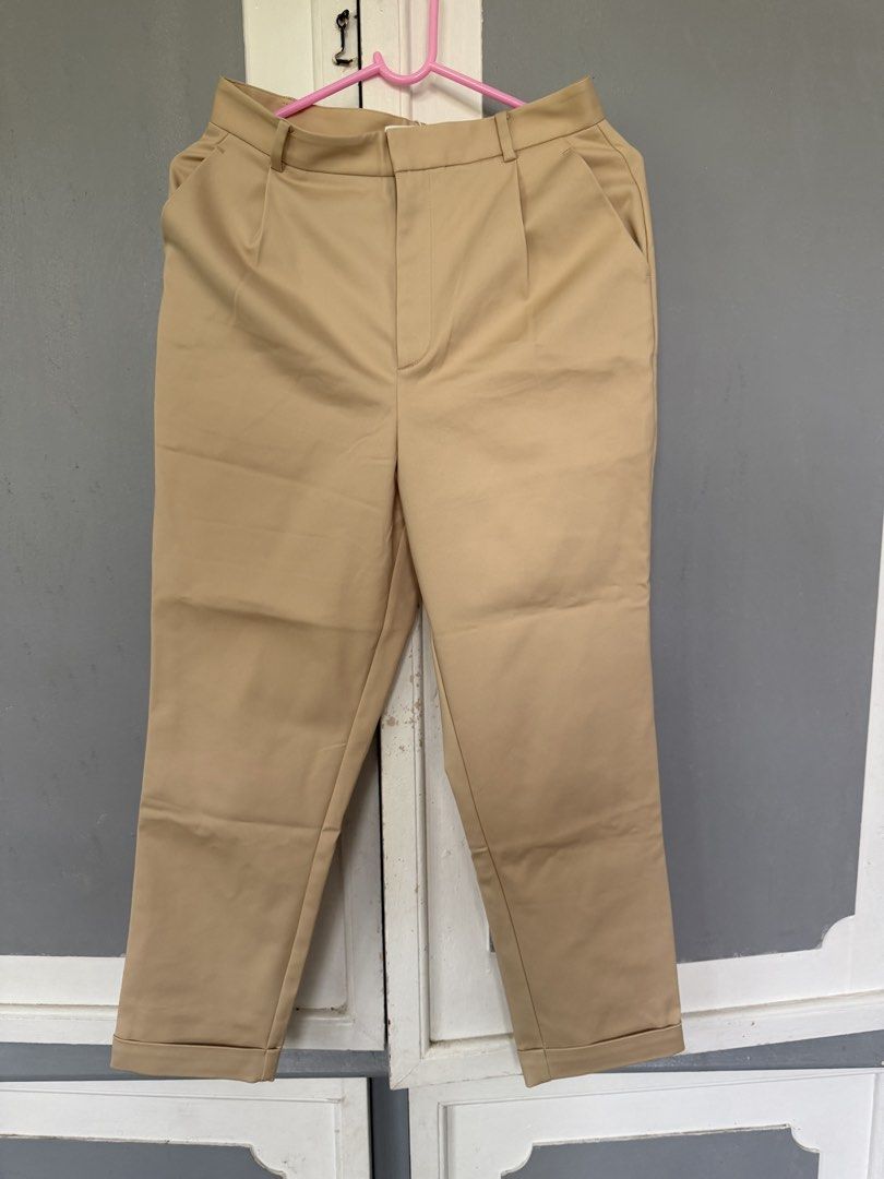Love Bonito Sand Pants Size 28 (Category: Jeans) located in Zamboanga. Submitted by attyjasc (Listing ID 1467479933, Image 1). Description: - Brand: Love Bonito - Color: Sand - Size: Waist 28 - Condition: Brand new, never worn with original store and fabric tags attached - Fit & Details: Tailored fit, stylish pleated front, and trendy folded cuffs at the hem.