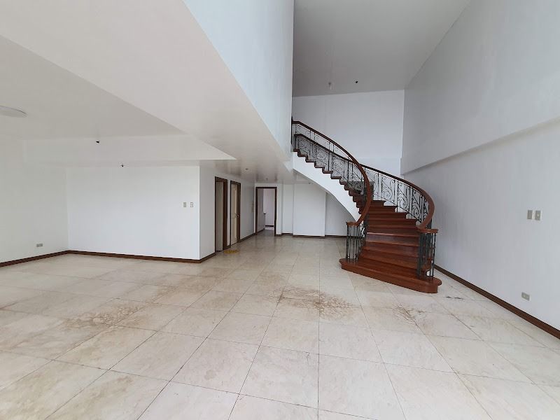 LPL Condominium at Greenhills for Lease (Category: Apartments & Condos) located in San Juan City. Submitted by CCPProperties (Listing ID 1467439613, Image 2). Description: This is a 242sqm residential condominium unit featuring two floors, three bedrooms, three toilets and baths, a maid's room, a balcony and one parking slot. Please note that one of the bedrooms is conveniently located on the ground floor. The building also allows small dogs..