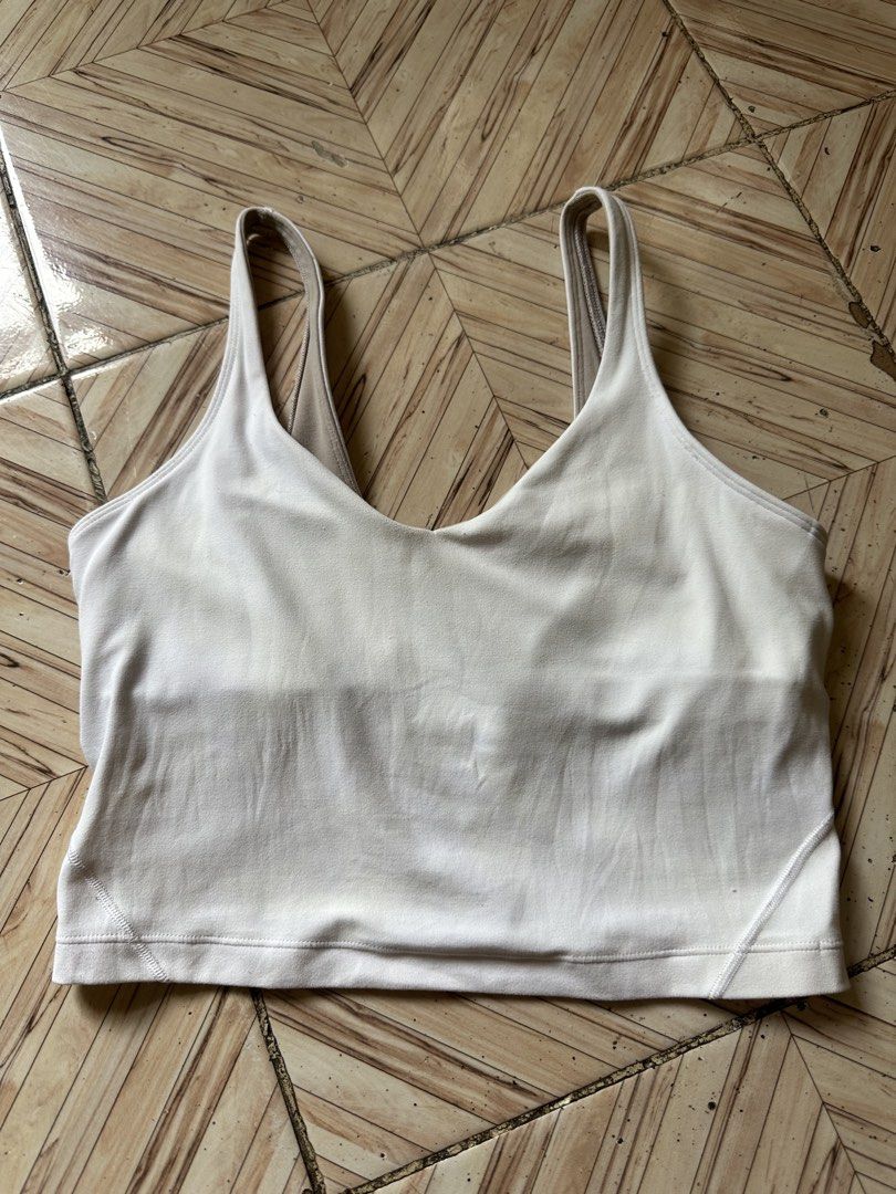 Lululemon Align Crop Tank Top White Size 6 (Category: Activewear) located in Angeles City. Submitted by alejeong27 (Listing ID 1467373532, Image 1). Description: need lang labhan may yellow stain pero makukuha nman sa laba no damage logo at dot.
