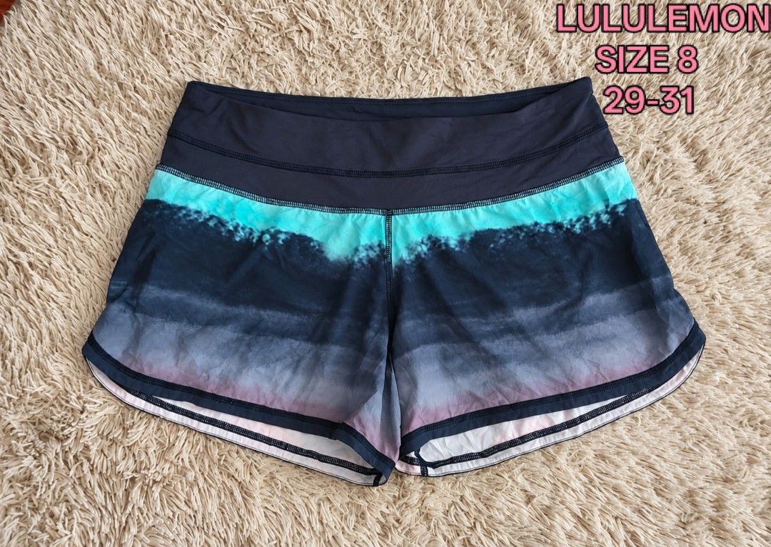 Lululemon Athletic Shorts Size 8 Multi Color Gradient (Category: Shorts) located in San Carlos City. Submitted by chinx008 (Listing ID 1467485433, Image 1). Description: - Brand: Lululemon - Size: 8 - Design: Stunning multi-color gradient (shades of blue, teal, purple, and pink) - Features: Wide waistband with built-in liner - Storage: Handy back zipper pocket for keys or cards - Safety: Reflective logo detail on the leg hem - Ideal for: Running,