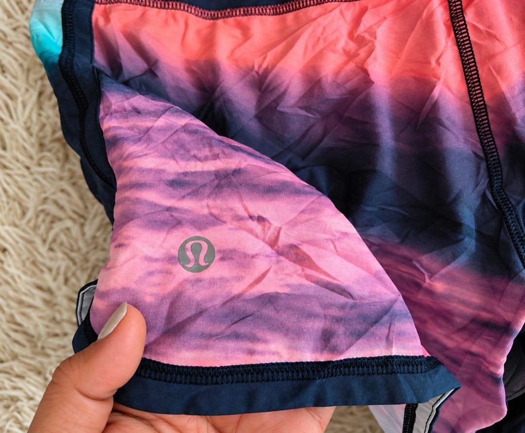Lululemon Athletic Shorts Size 8 Multi Color Gradient (Category: Shorts) located in San Carlos City. Submitted by chinx008 (Listing ID 1467485433, Image 3). Description: - Brand: Lululemon - Size: 8 - Design: Stunning multi-color gradient (shades of blue, teal, purple, and pink) - Features: Wide waistband with built-in liner - Storage: Handy back zipper pocket for keys or cards - Safety: Reflective logo detail on the leg hem - Ideal for: Running,