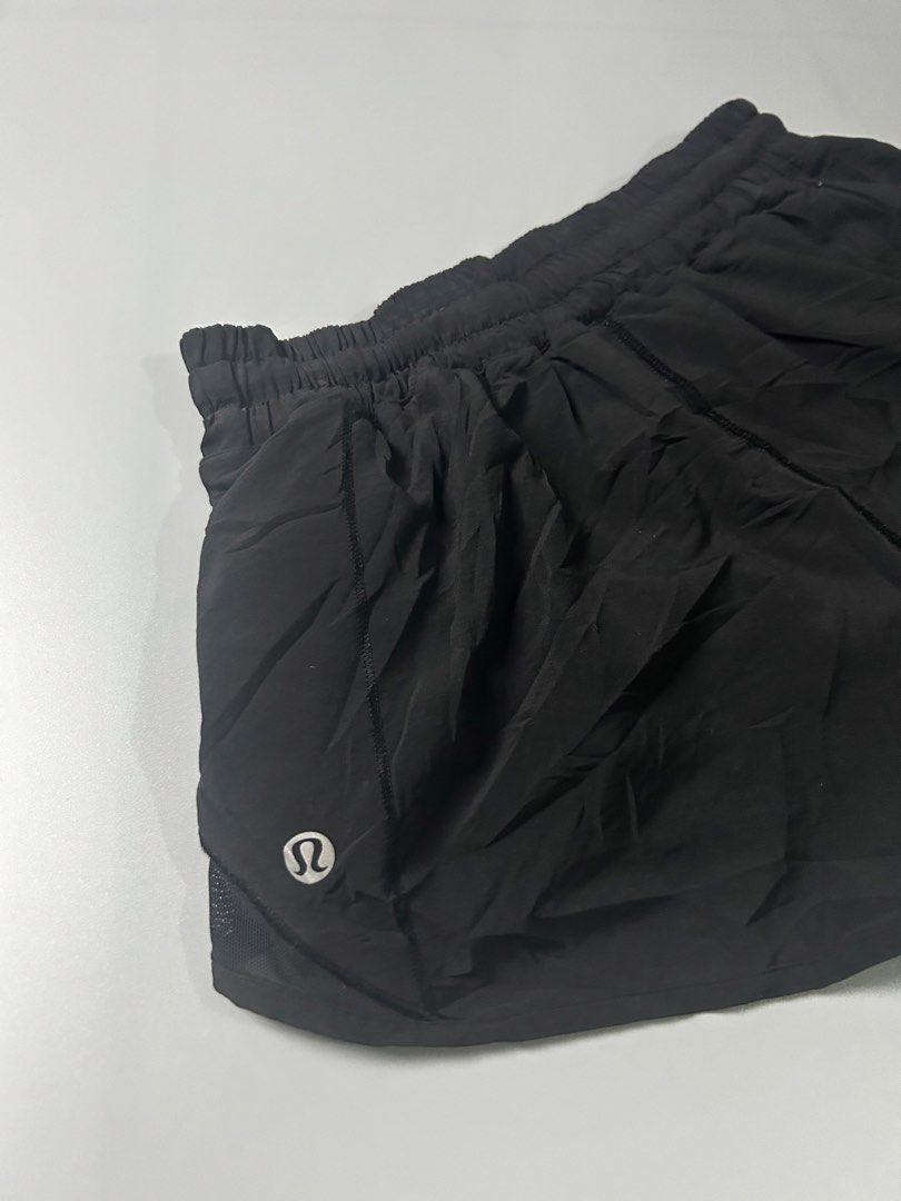Lululemon Black Athletic Shorts Size 4 (Category: Shorts) located in Tacloban City. Submitted by azthrifting24 (Listing ID 1467578357, Image 3). Description: - Brand: Lululemon - Color: Black - Size: 4 (verified by size dot inside the pocket) - Material: Lightweight, breathable fabric - Features: Elastic waistband, side mesh panels, and reflective logo - Condition: Great for running, workouts, and active lifestyle.