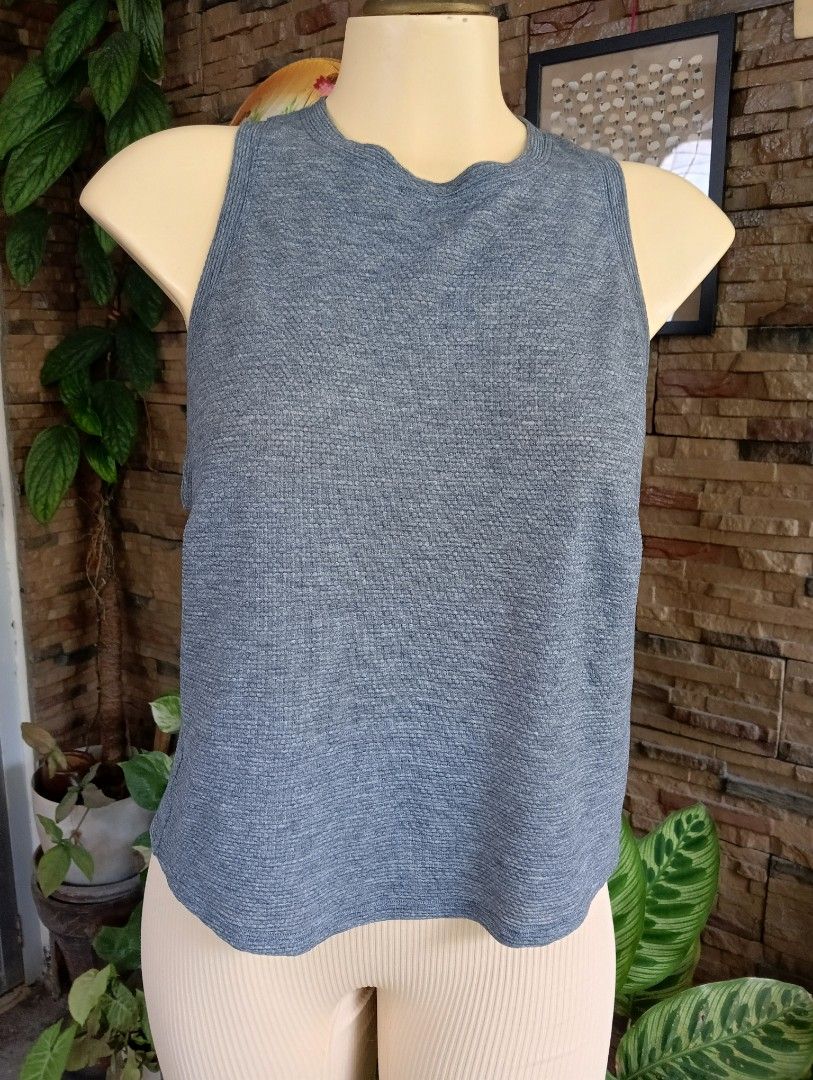 Lululemon Breeze Top (Category: Activewear) located in Rizal. Submitted by timeless_shop (Listing ID 1467416737, Image 3). Description: 🔥 ORIGINAL Lululemon Grey Tank Top - Textured - Size 6 📏 Width: 14 inches lay flat 📏 Length: 20 inches 📏 Bust: Kasya 32-34 inches 🎨 Color: Heather Grey / Slate Grey ✂️ Style: Racerback Muscle Tank - textured / waffle fabric! 💯 Condition: 9.8/10 Good Condition - Like New! ✨ 🎨 Color Rate: 9.8/10 - Slate Gray