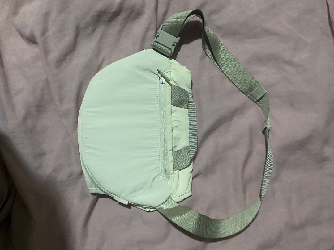 Lululemon Crossbody Bag White (Category: Cross-body Bags) located in Manila. Submitted by netgnet (Listing ID 1467512714, Image 2). Description: - Brand: Lululemon - Color: White - Material: Lightweight nylon - Dimensions: 33.5 x 18 cm - Strap: Adjustable with buckle closure - Pockets: Convenient back zipper pocket - Details: Interior round logo patch - Condition: Brand new / Excellent - Perfect for daily use and errands.